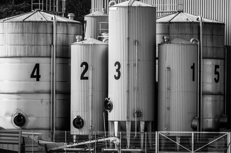 fermentation tanks brewery worker